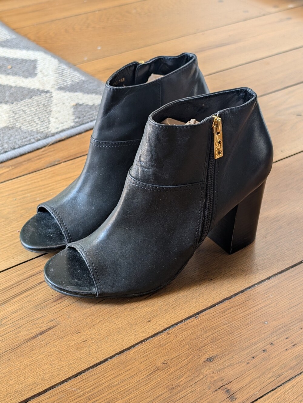 Cole Haan Grand Os Women’s Black Peep-Toe Ankle Booties with Gold Zip